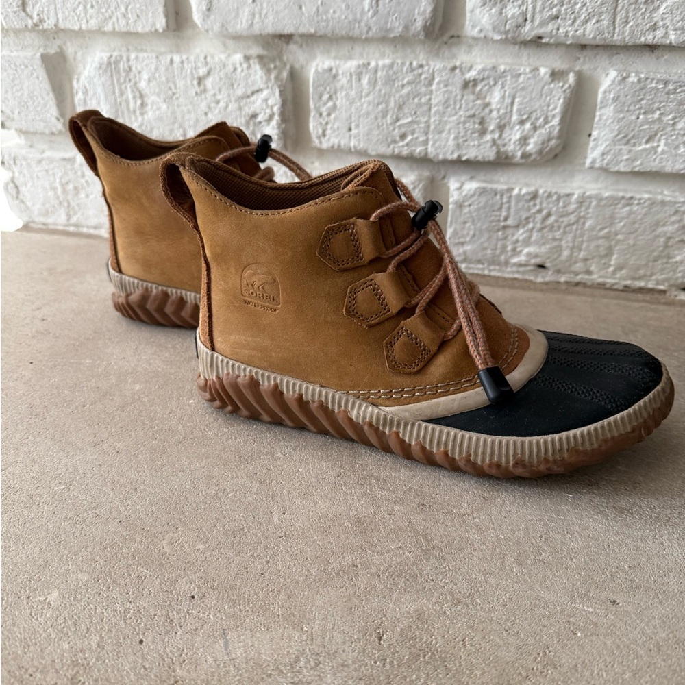 Sorel Tan and Black Lace-Up Boots